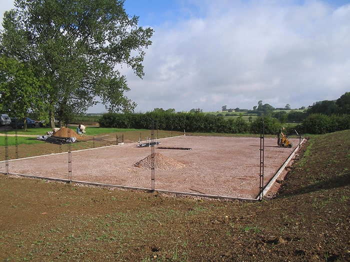 Tennis court construction in progress. Copyright En Tout Cas.